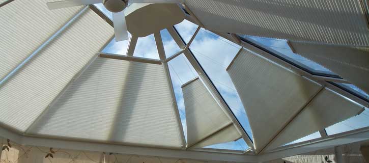 Shaped pleated rooflight blinds
