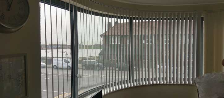 Shaped pleated blinds